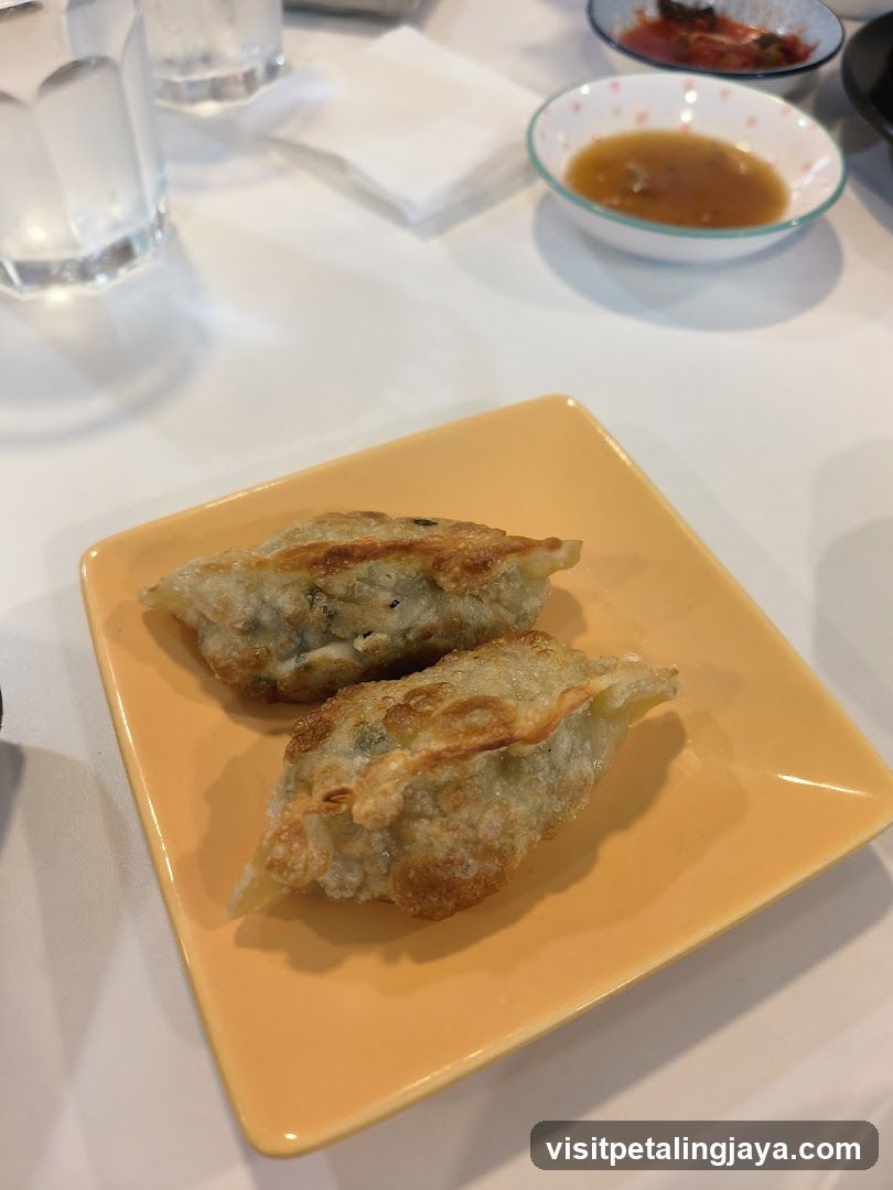 Gyoza on a yellow plate
