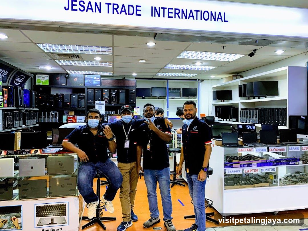 Tech Store Interior with Staff
