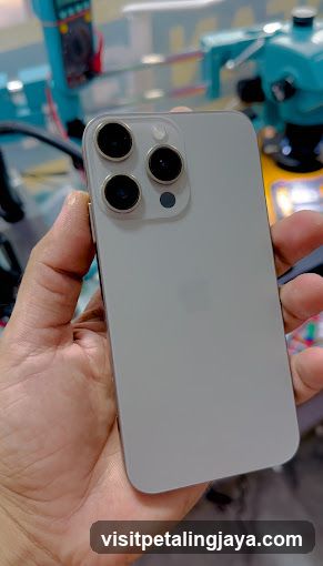 iPhone in hand
