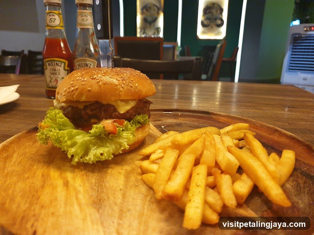 Burger and Fries on Wooden Board