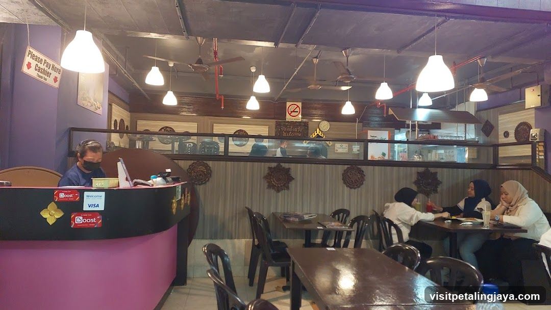 Restaurant Interior with Cashier and Dining Area