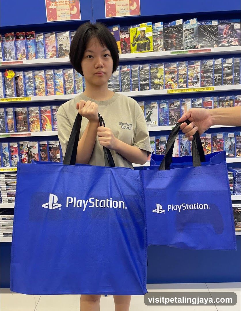 Girl holding PlayStation bags in store