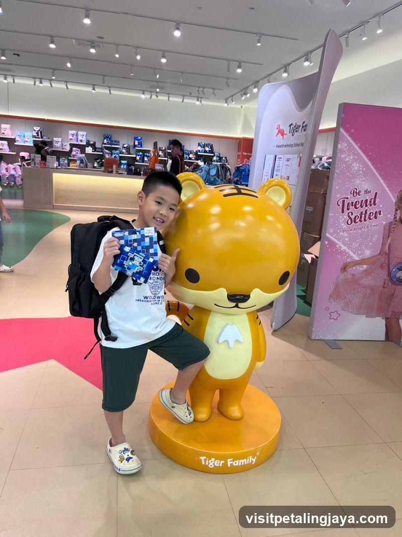 Boy with Tiger Family Statue