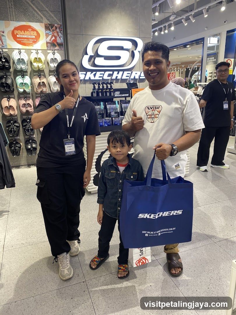 Skechers Store Interior with Staff and Customer