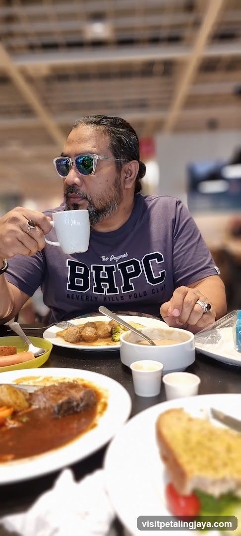 Man Eating at a Restaurant
