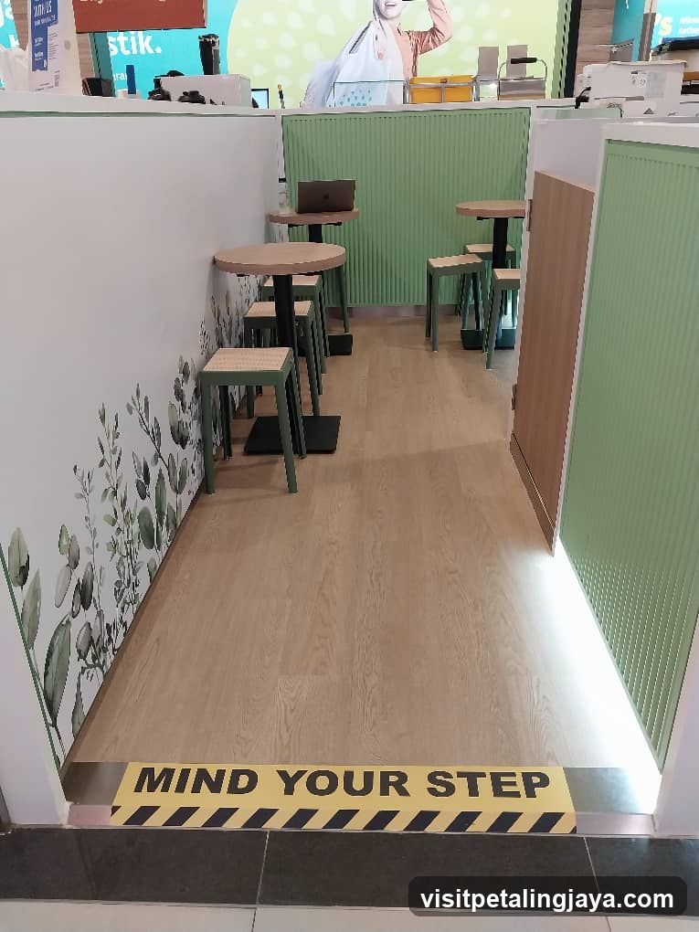 Interior seating area with warning sign