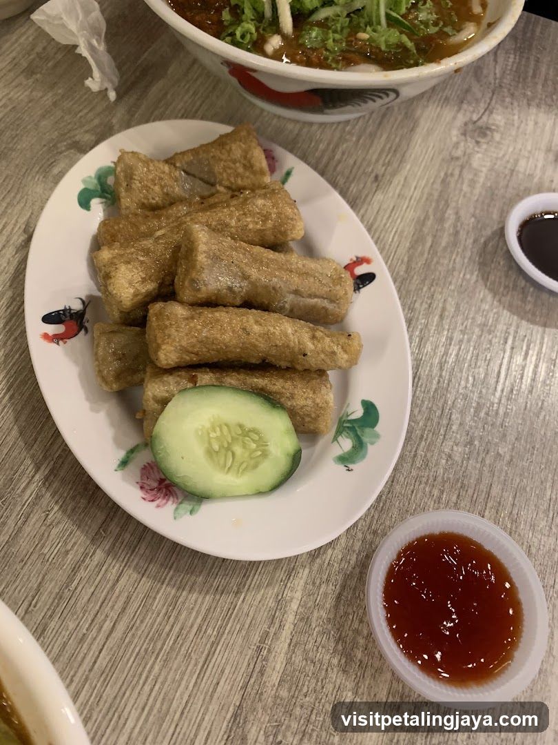 Fried Food with Sauce and Cucumber
