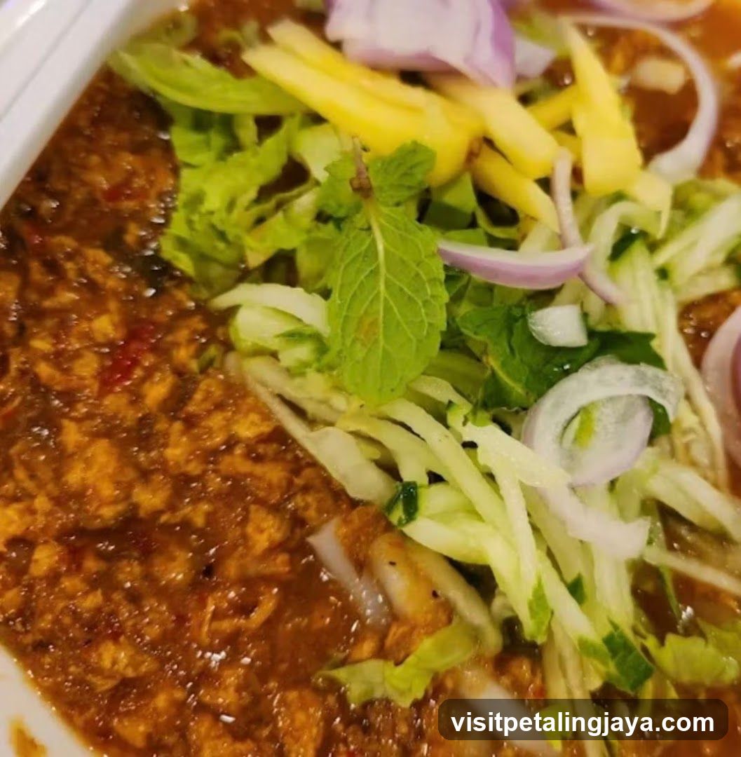 Spicy Curry with Fresh Salad Topping