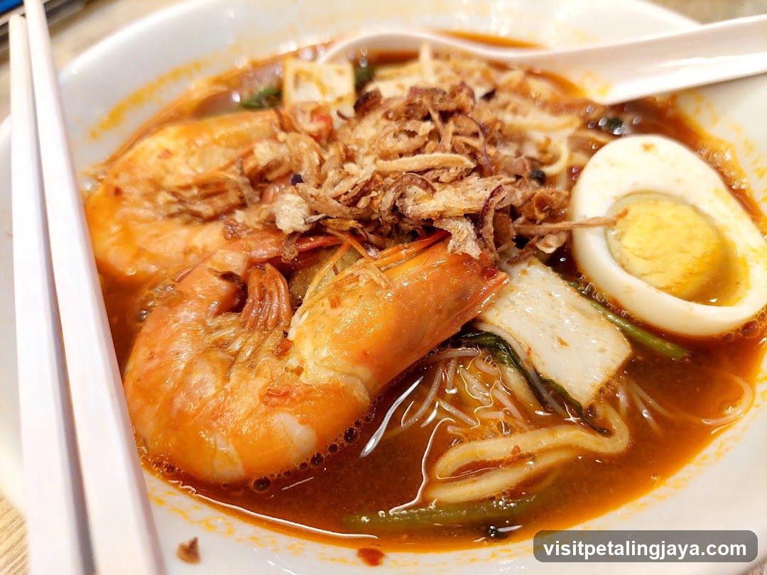 Shrimp Noodle Soup with Halved Egg and Fried Shallots