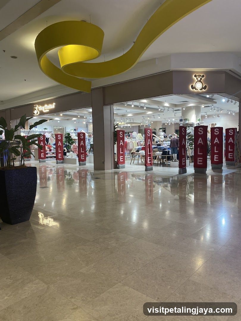 Shopping Mall Interior with Sale Signs