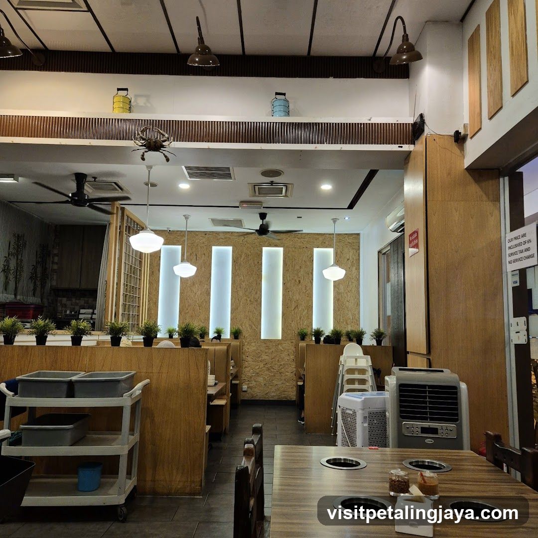 Restaurant Interior with Wooden Booths and Hanging Lights