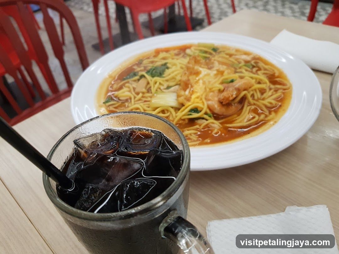 Noodle Dish and Iced Drink
