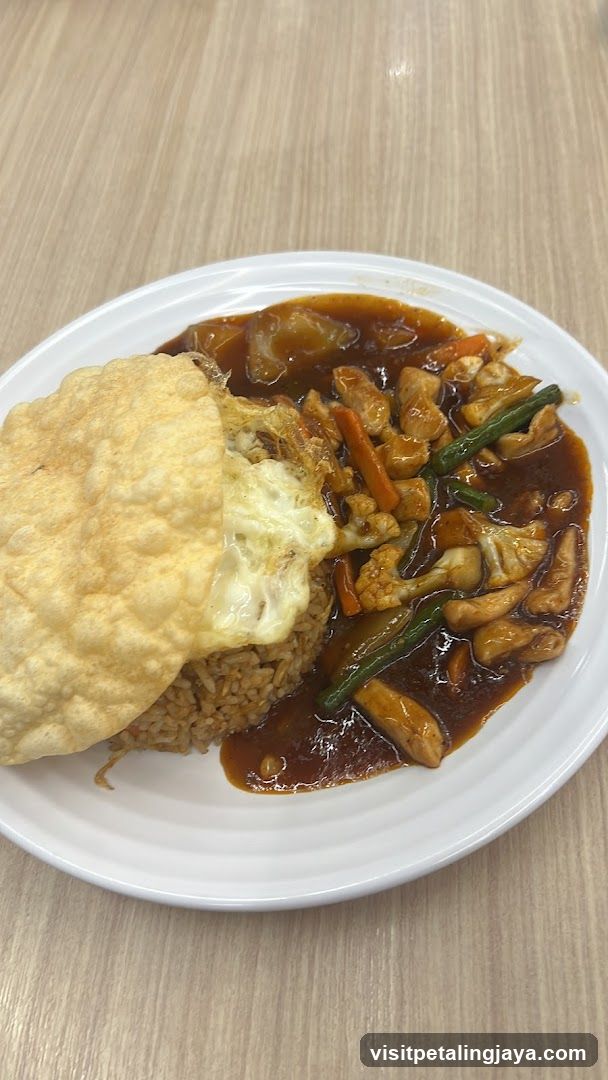 Stir-fried Chicken with Rice and Fried Egg