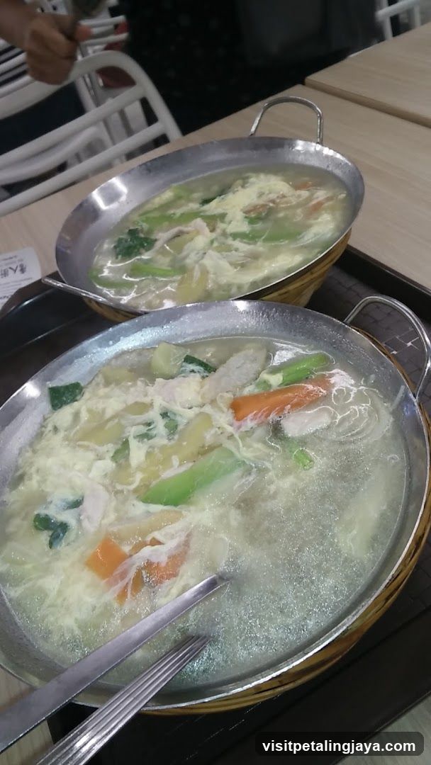Vegetable Soup in Metal Pots