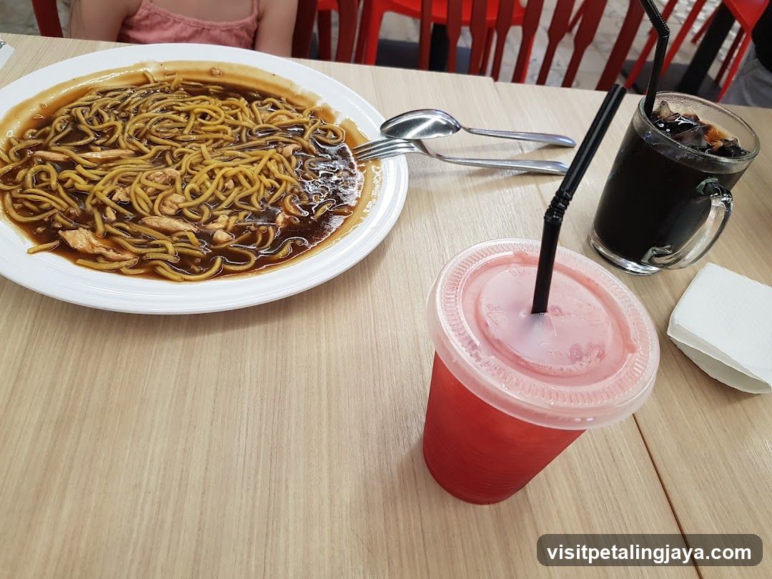 Noodles and Drinks at a Restaurant Table