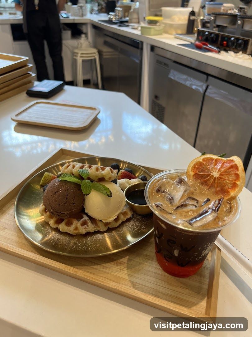 Waffle and Iced Coffee in Cafe Interior
