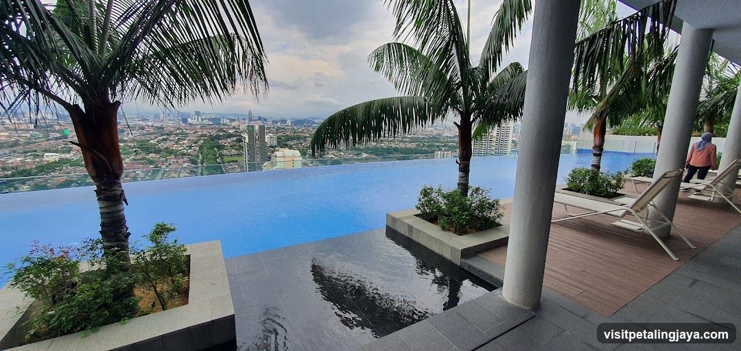 Infinity Pool View with Cityscape