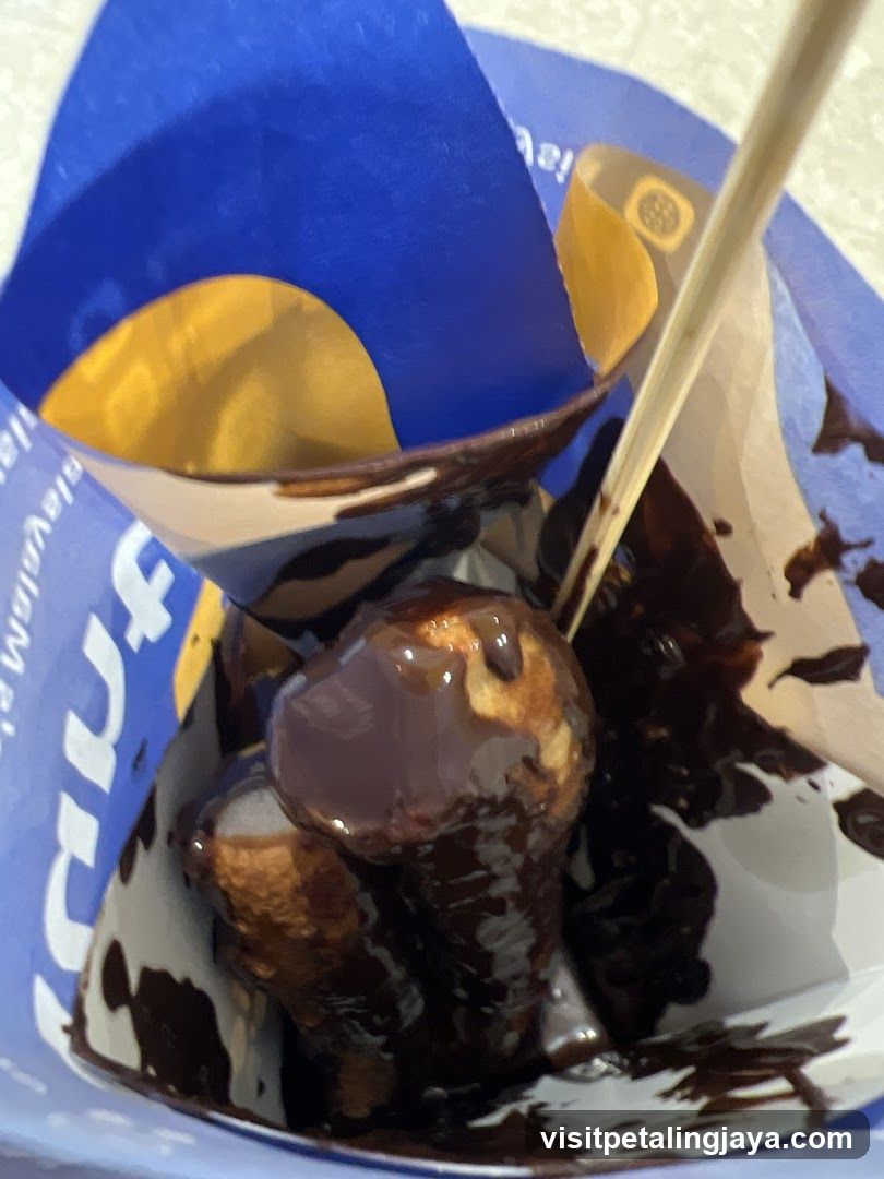 Chocolate-covered pastry in a cup