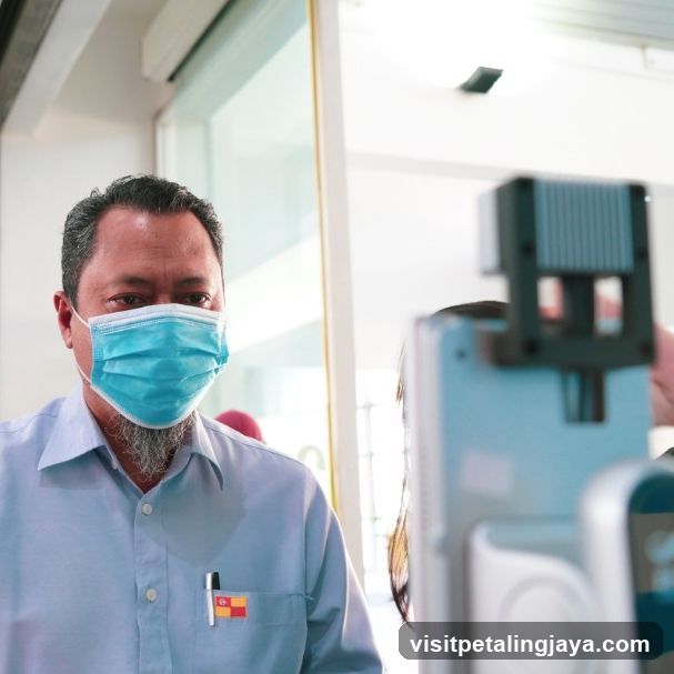 Man with Mask and Pen in Light Blue Shirt
