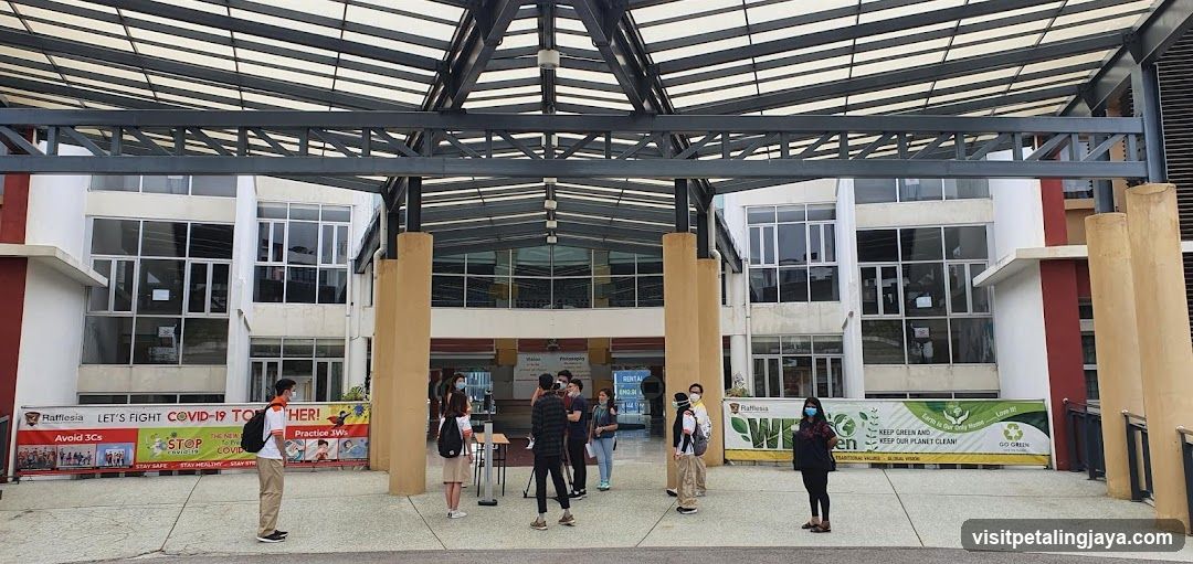 Entrance with banners and people