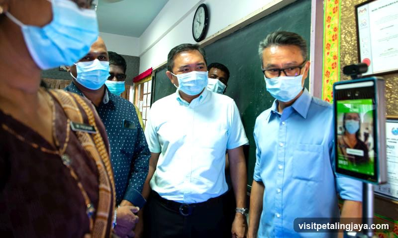 Indoor Group with Face Masks and Biometric Scanner
