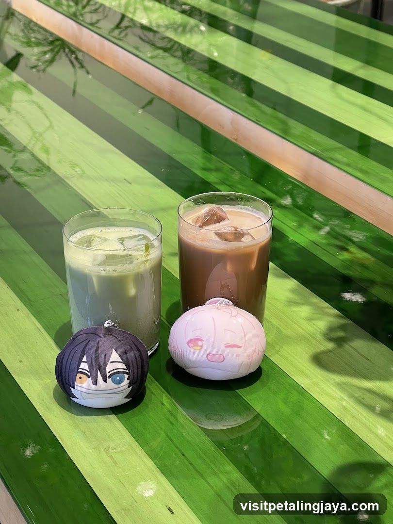 Anime Merchandise and Drinks on Green Table