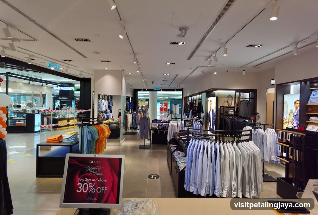 Clothing Store Interior with Discount Sign