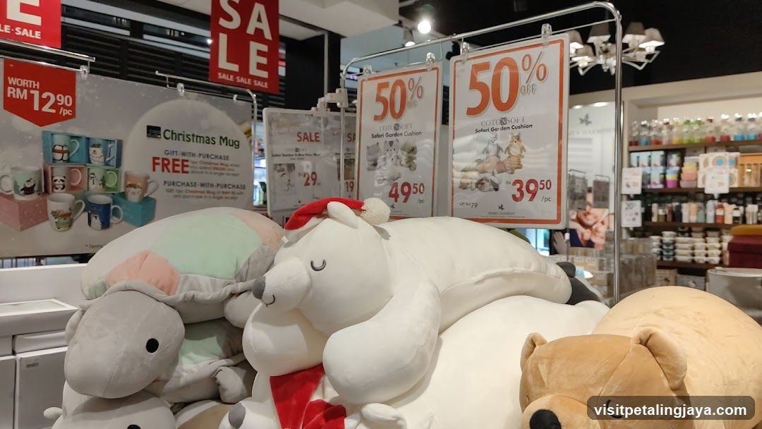 Christmas Sale Display with Plush Toys and Mugs