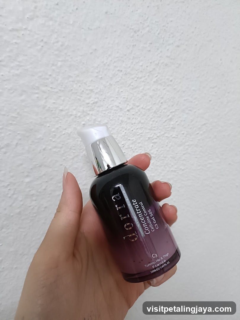 Hand holding a cosmetic product