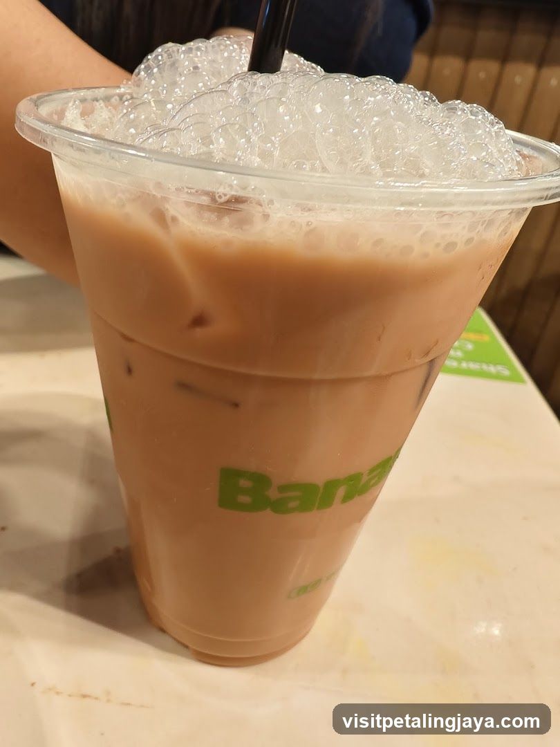Iced beverage in plastic cup