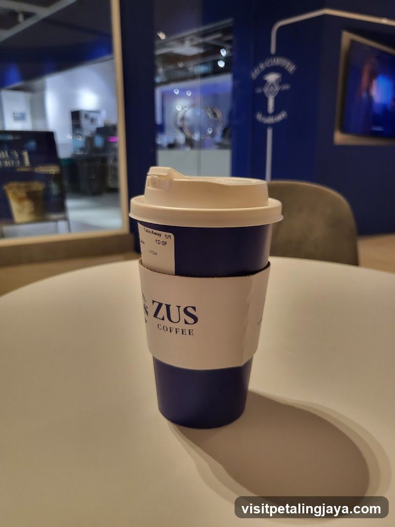 Zus Coffee Cup on Table