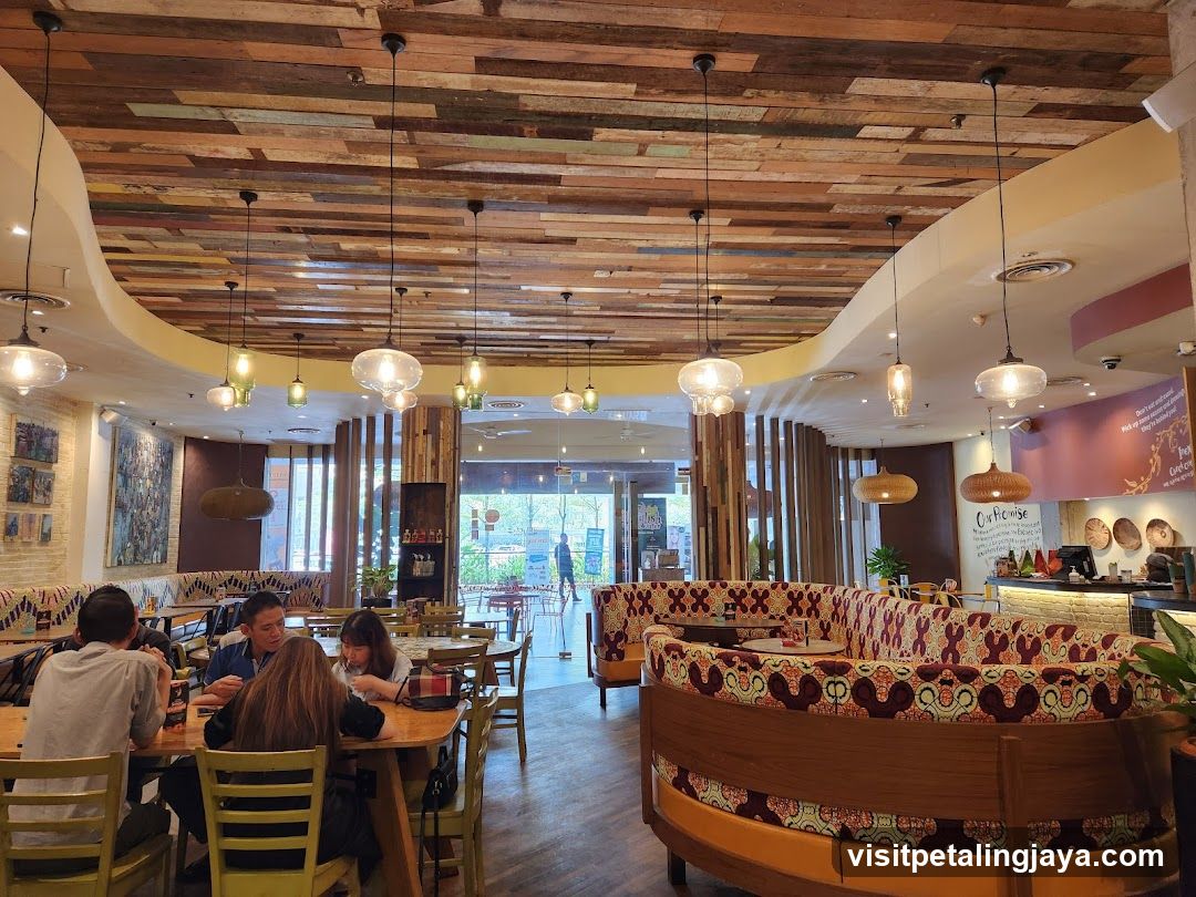 Restaurant Interior with Wooden Ceiling and Patterned Booths