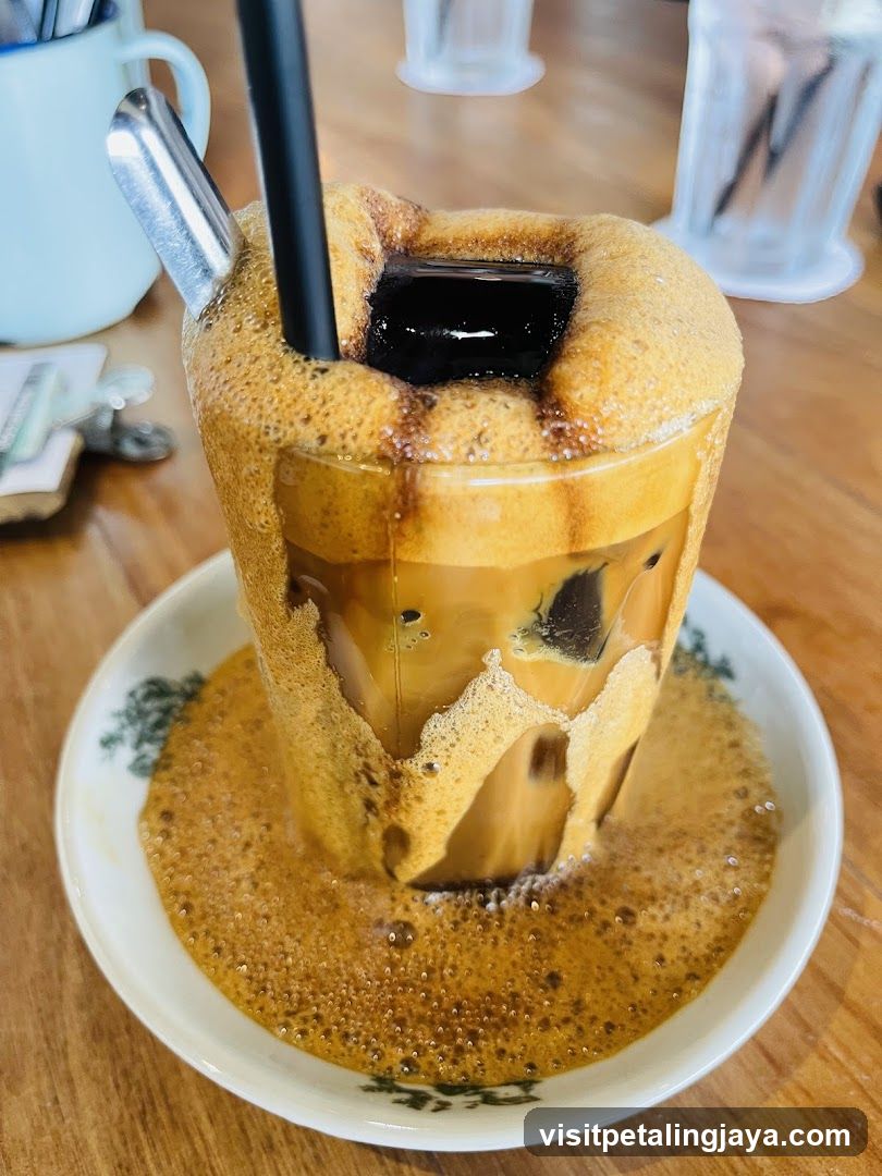 Iced Coffee with Foam Overflow