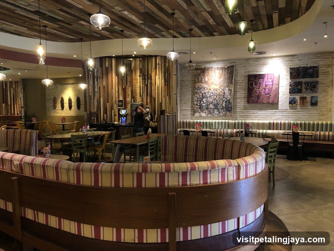 Restaurant Interior with Curved Booths and Wooden Ceiling