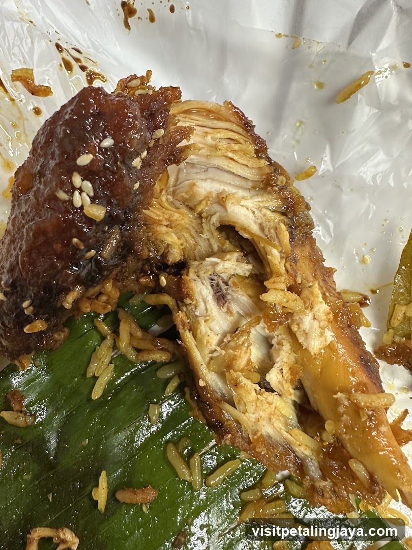 Fried Chicken with Rice on Banana Leaf