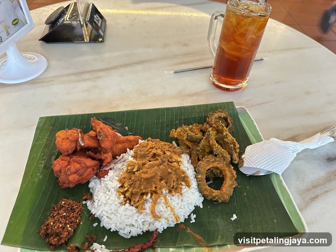 Rice and Curry Meal on Banana Leaf