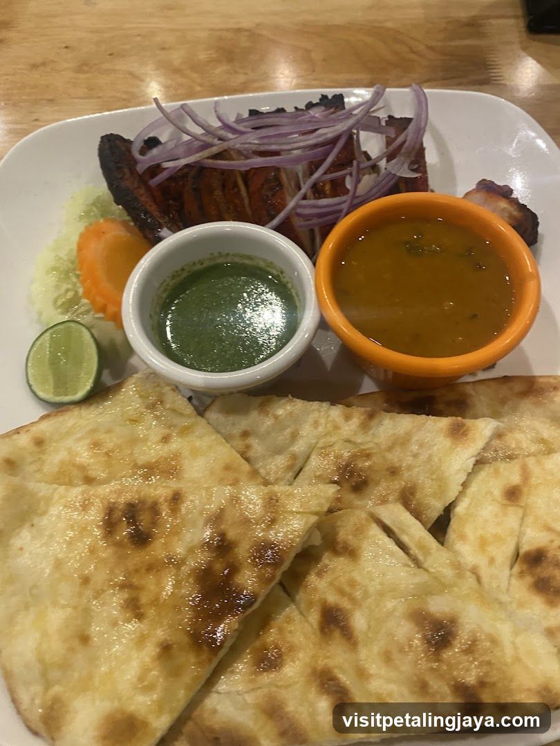 Grilled Meat Platter with Naan Bread and Sauces