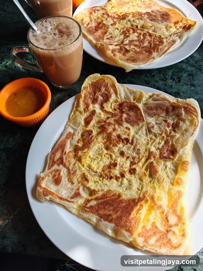 Breakfast with Roti Canai and Tea