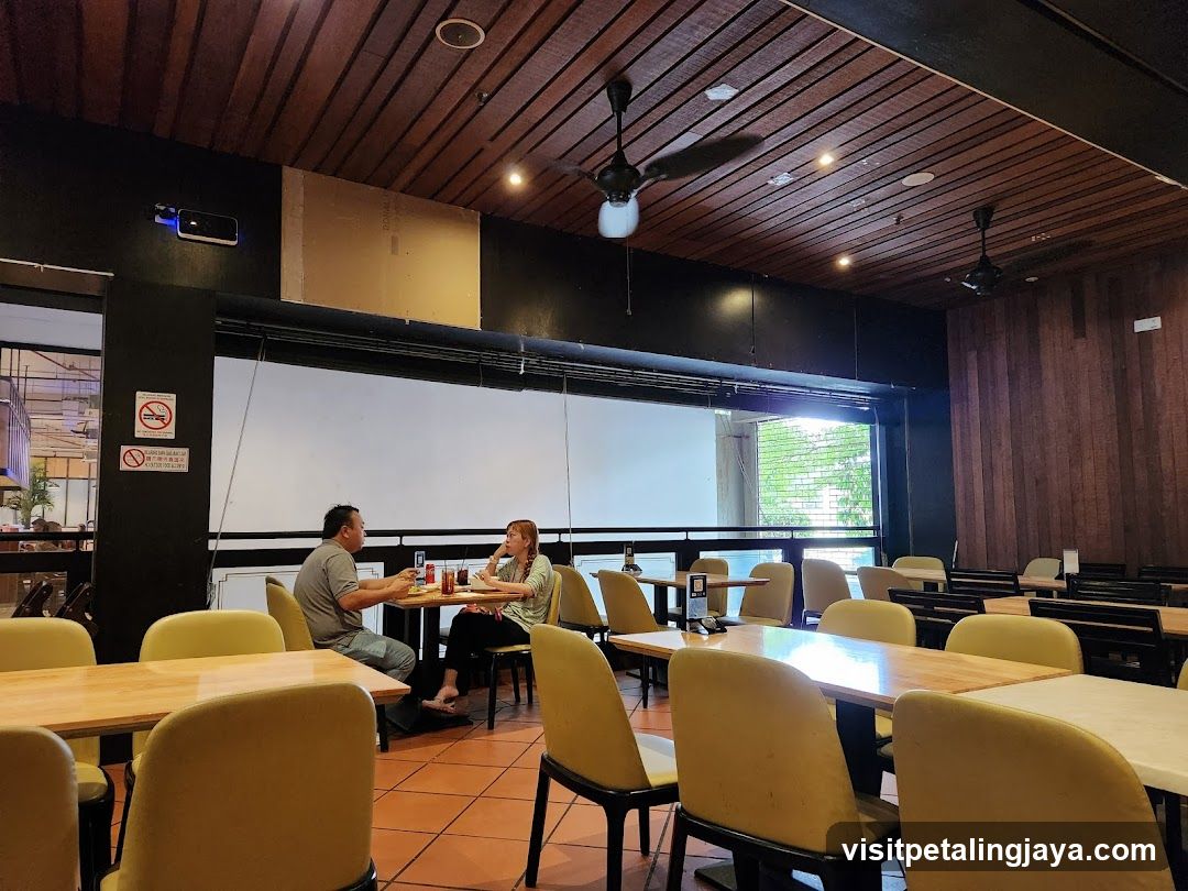 Restaurant Interior with Two Patrons