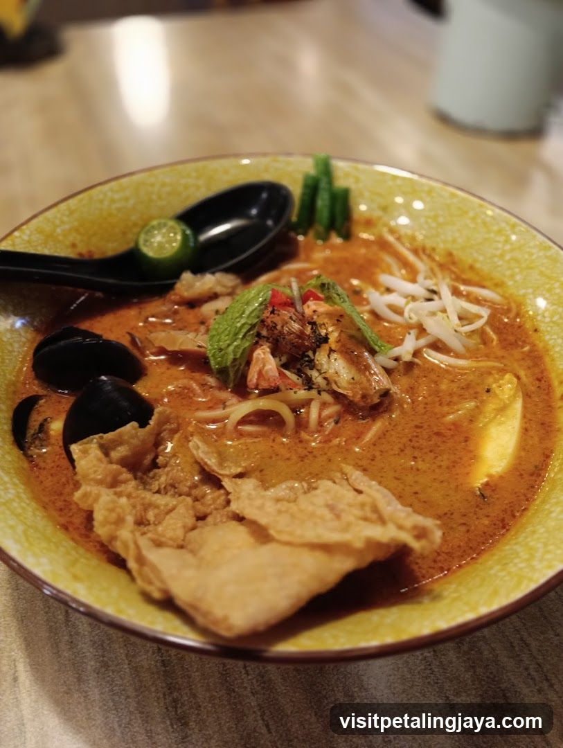 Bowl of Curry Noodles with Seafood and Vegetables