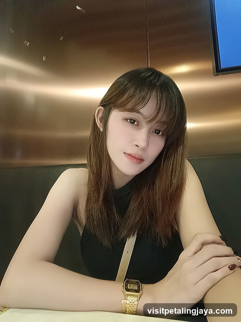 Woman in Black Top with Gold Watch
