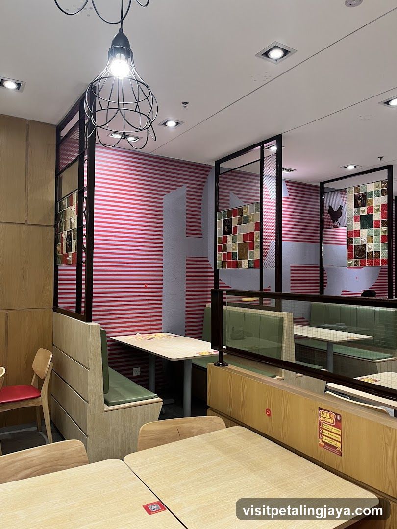 Restaurant Interior with Red Striped Walls and Green Booths