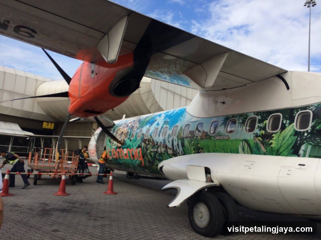 Aircraft with Tropical Livery at Airport