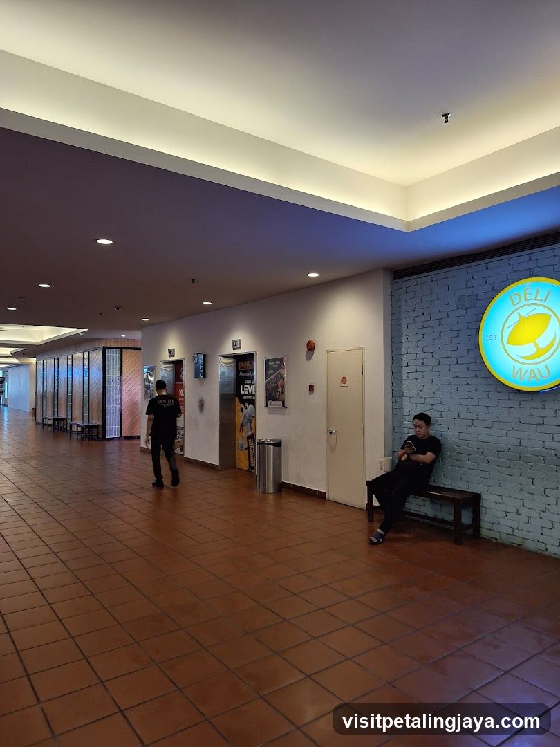 Interior Corridor with Signage and Seating Area