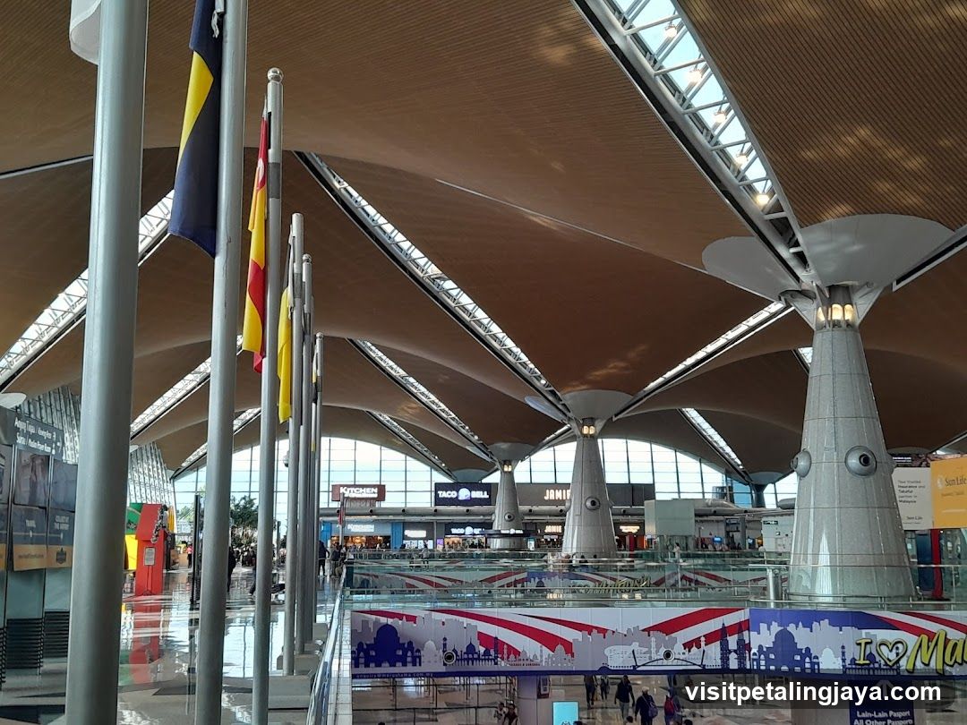 Airport Terminal Interior with Flags and Shops