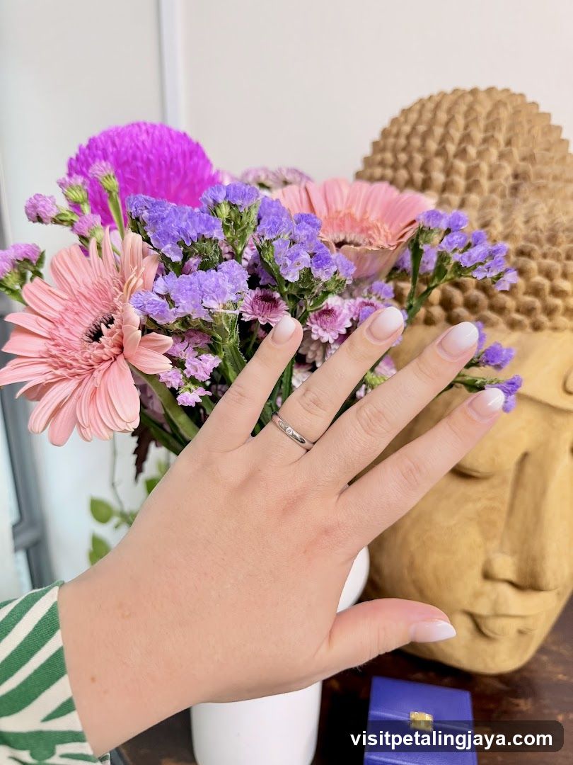 Flower Arrangement with Buddha Statue