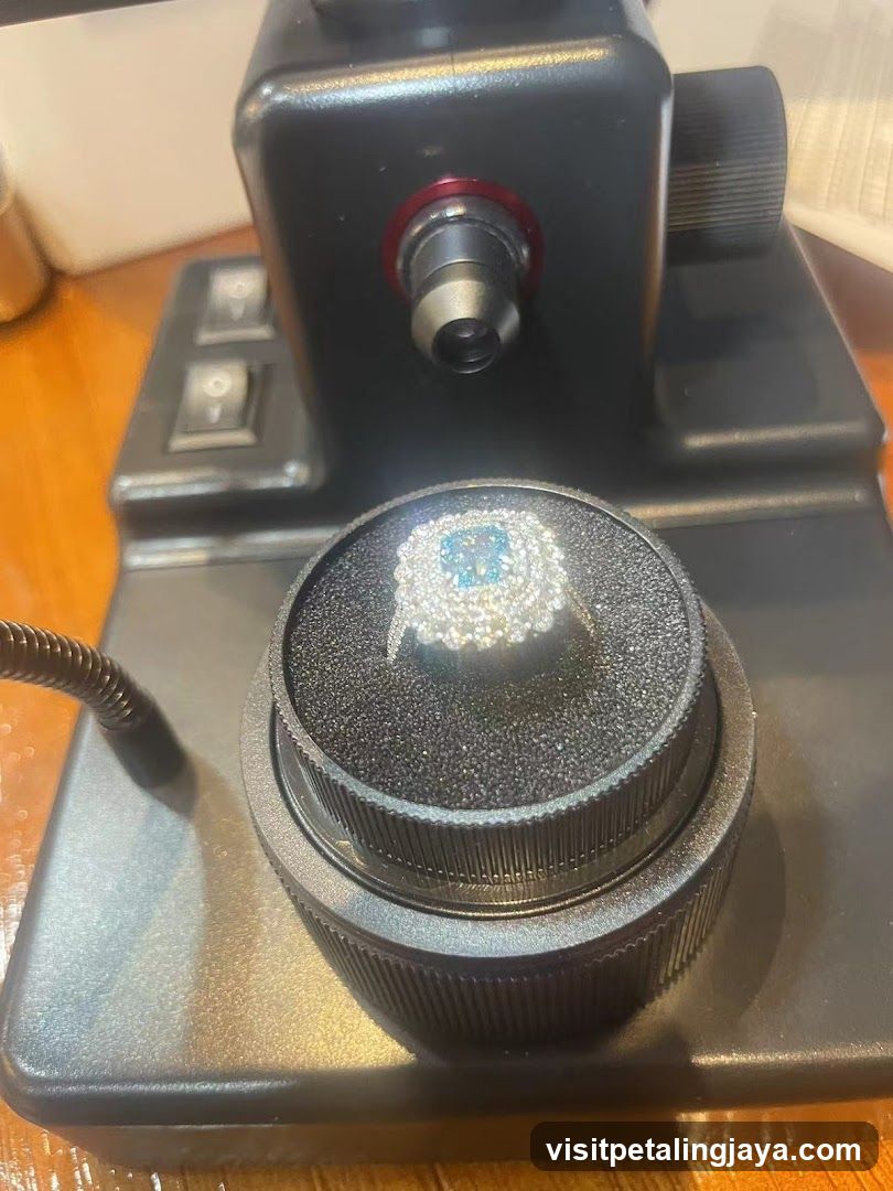 Close-up of a jewelry loupe on a microscope base