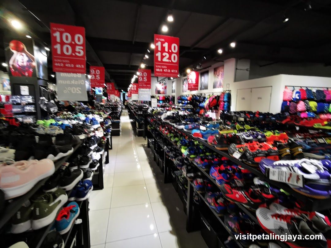 Shoe Store Interior with Discount Signs