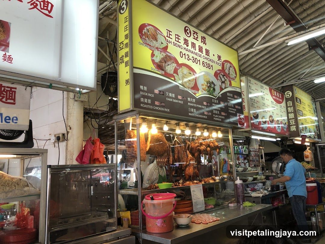 Food stall interior with roasted chicken display