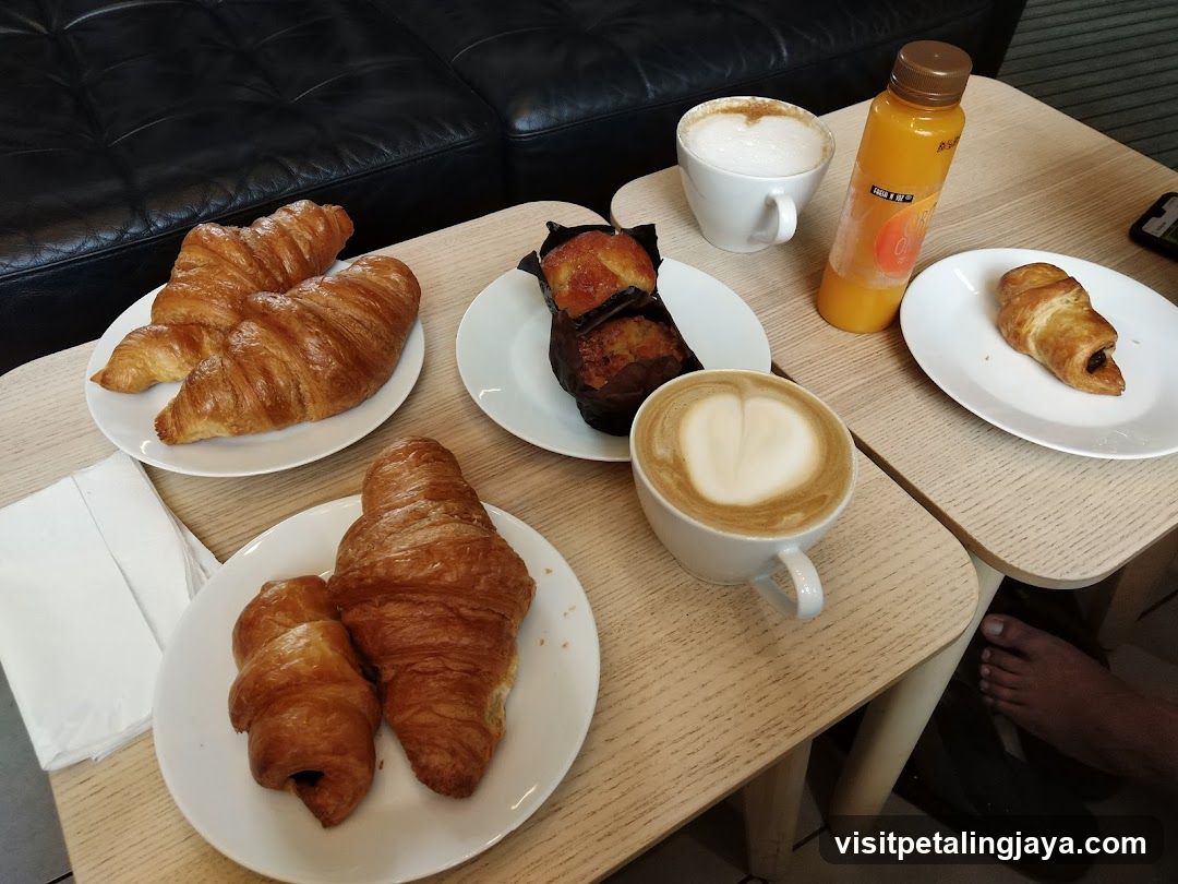 Breakfast Spread with Croissants and Coffee